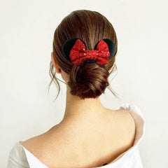 CellElection sequin bow detail showcasing sparkle that adds festive shine to hairstyles