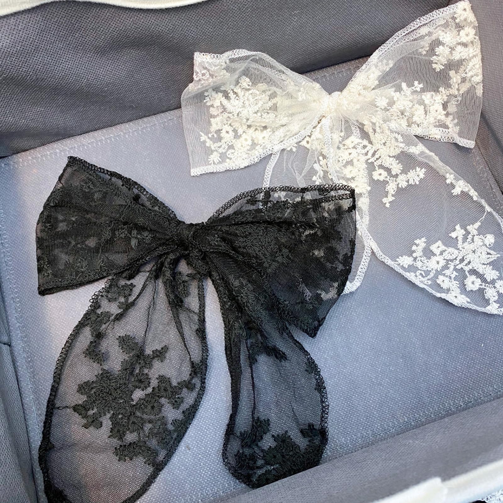 CELLIFEZY front view showing both black and white bows, elegant accent