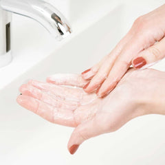 Lather in hand using CeraVe bar demonstrating gentle, hydrating foam