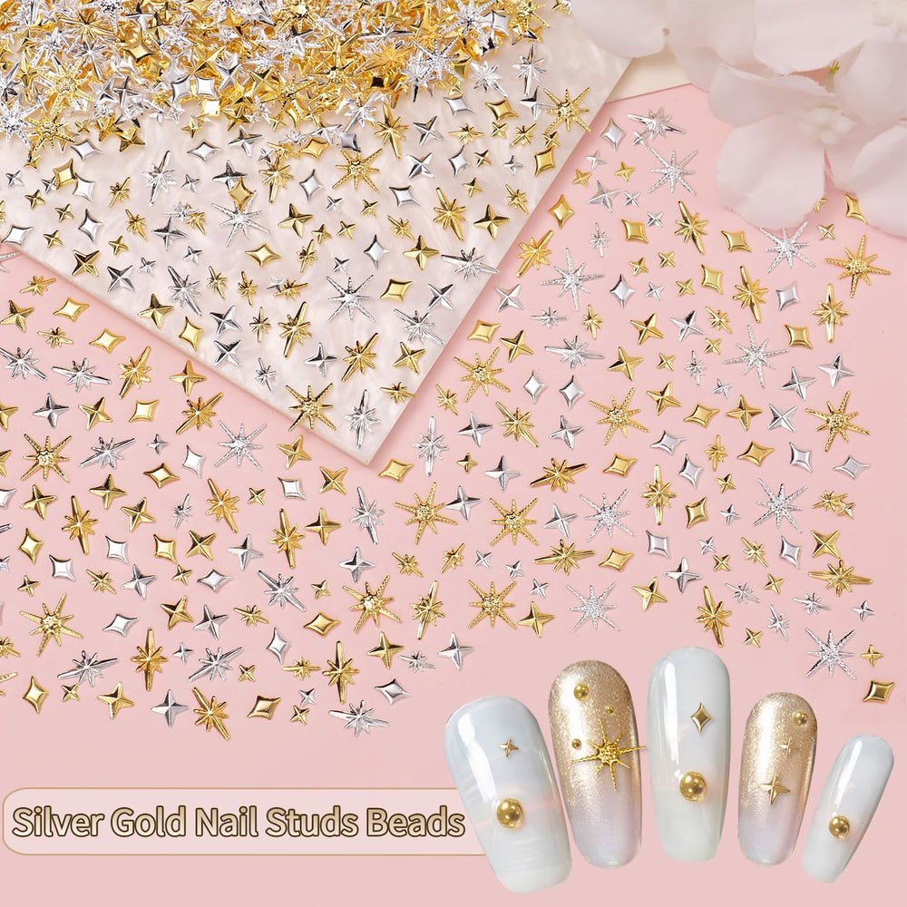 CESUSME finished nail design with beads and charms showcasing metallic 3D accents