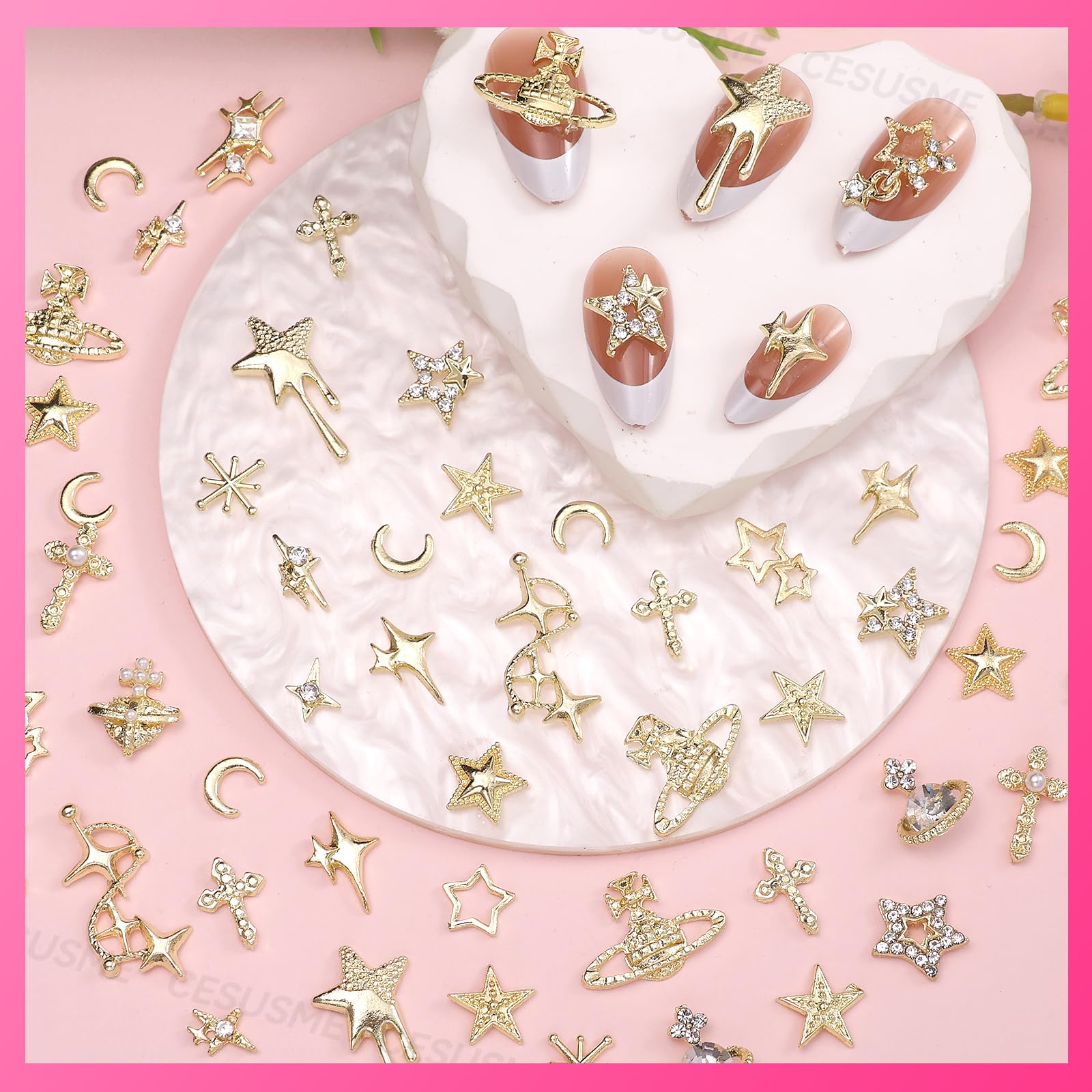 CESUSME assorted star, cross, moon and planet charms laid out for design planning