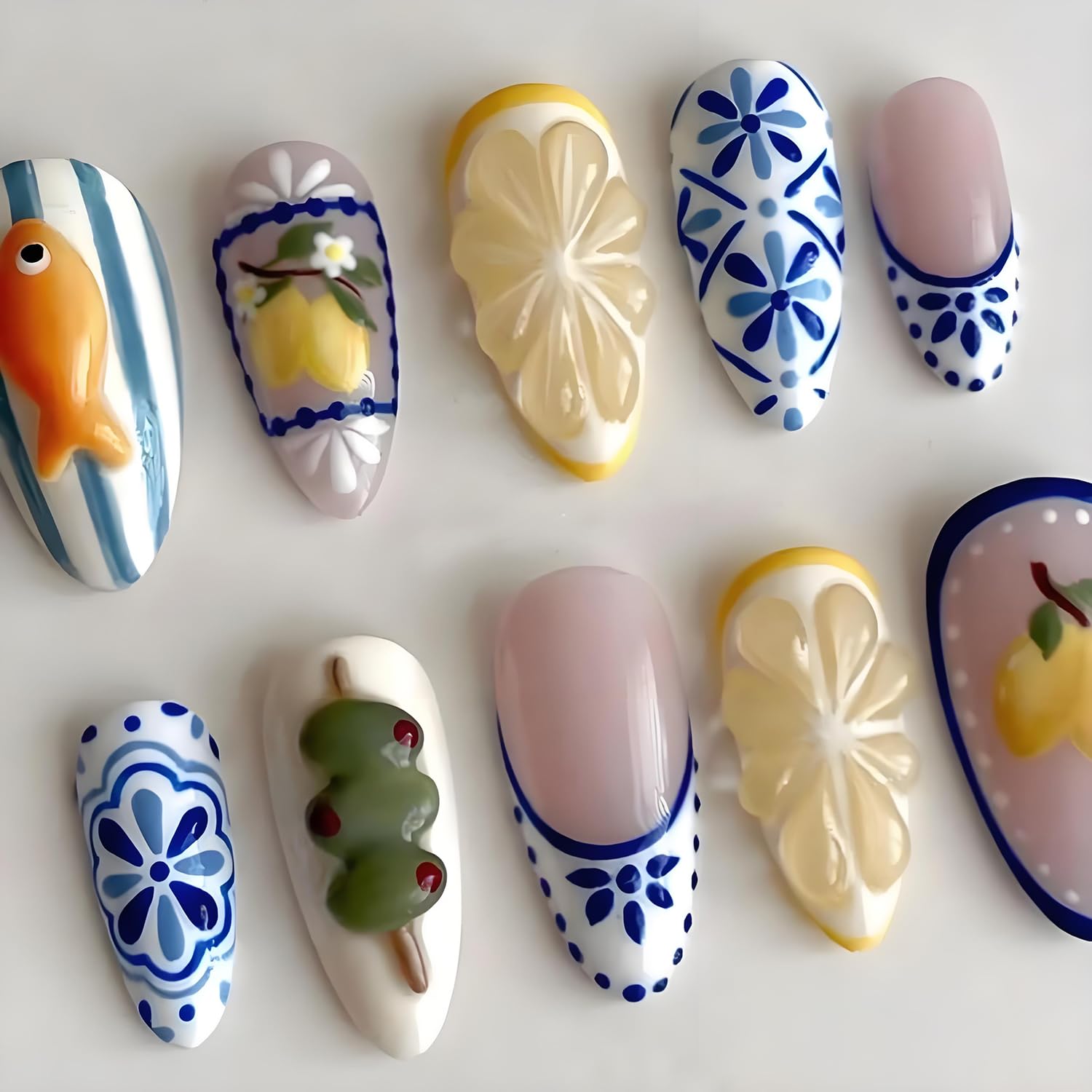 CEWEWP close-up of 3D goldfish and lemon details highlighting playful summer nail art