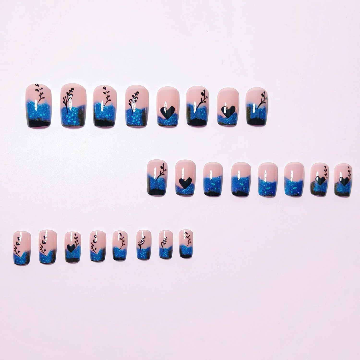 CEWEWP nails in hand for scale demonstrating natural short length
