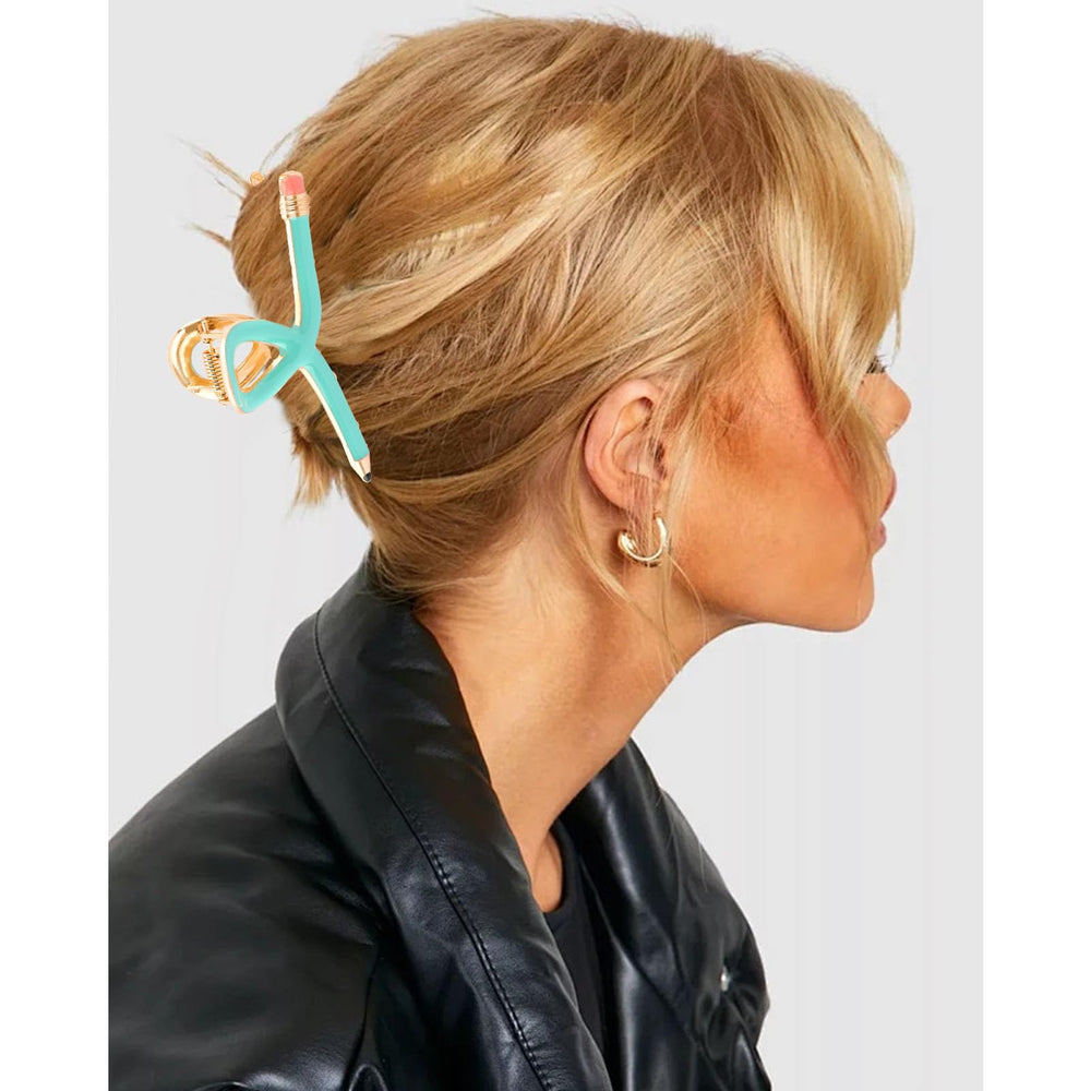 Chanaco clip beside hand to show scale, compact travel-friendly size