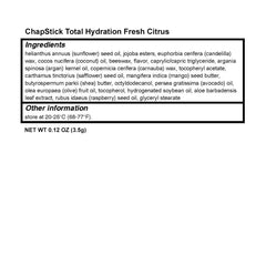 Person applying ChapStick outdoors demonstrating quick lip hydration