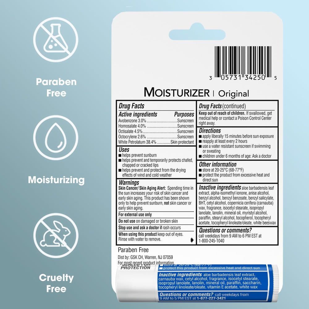 ChapStick Moisturizer on a beach towel illustrating travel and sun care