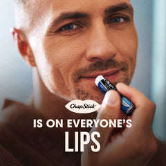ChapStick next to keys showing pocket-size portability and on-the-go protection