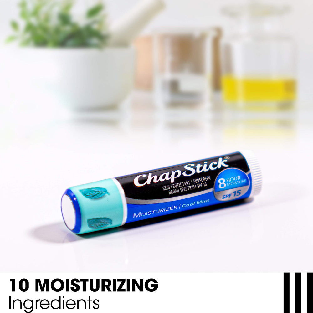 ChapStick in hand for scale showing compact size and easy portability benefit