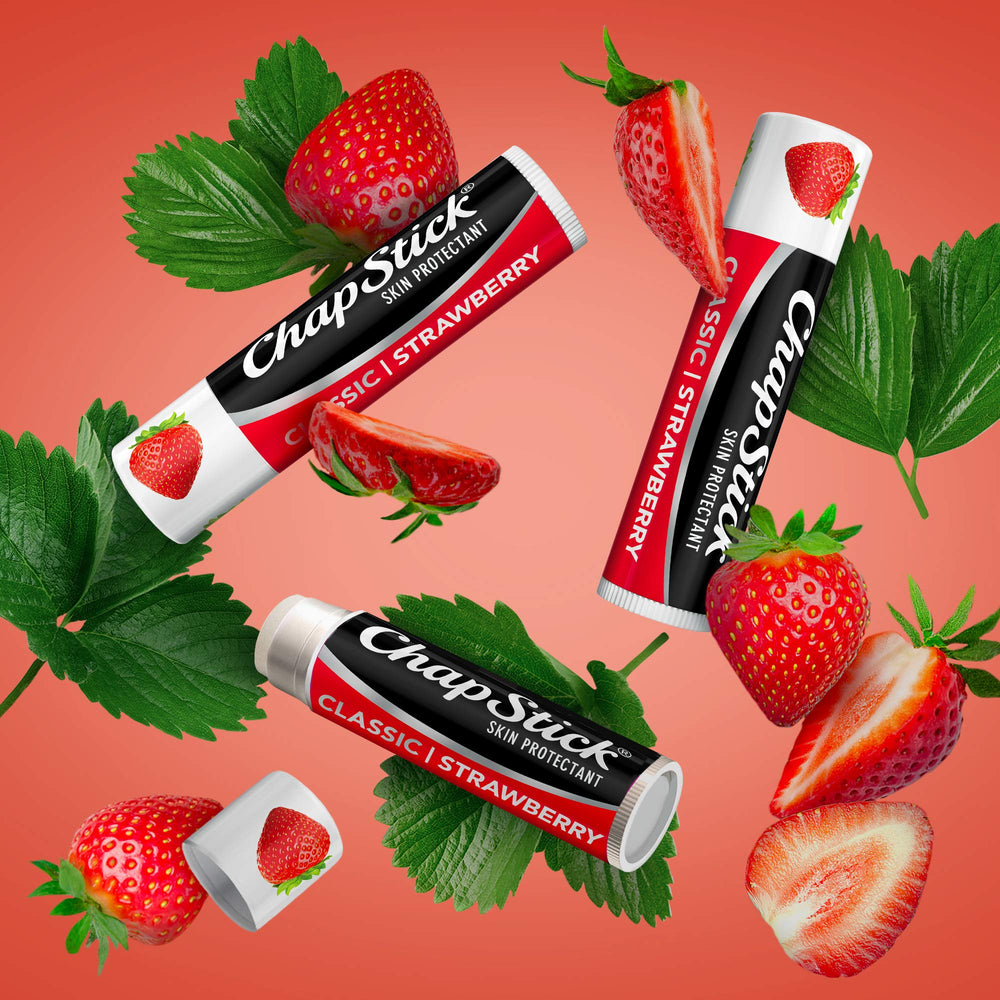 ChapStick strawberry close-up on lips showing sheer pink tint and natural-looking refresh benefit