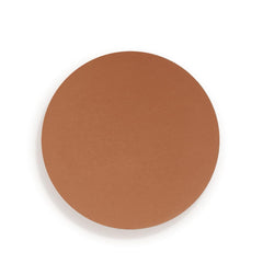 Charlotte Tilbury bronzer held in hand to show compact size and portability