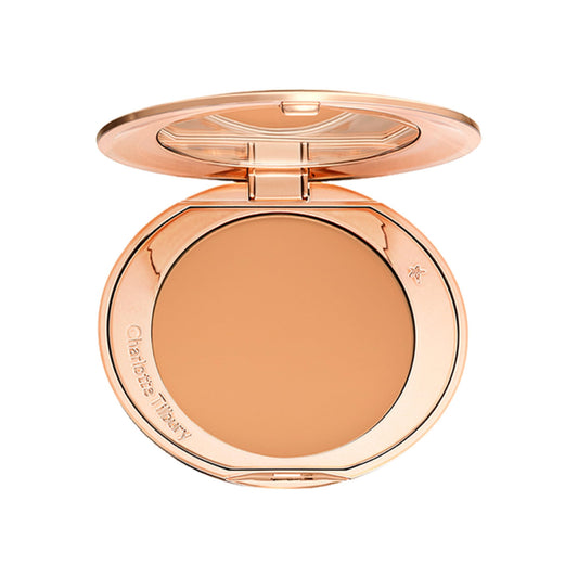 Charlotte Tilbury compact front view shows elegant packaging and travel convenience