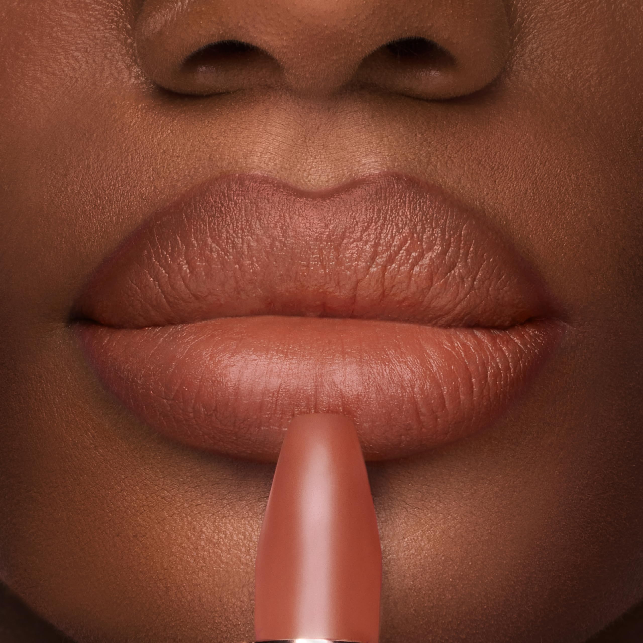 Charlotte Tilbury lip application close-up demonstrating smooth coverage