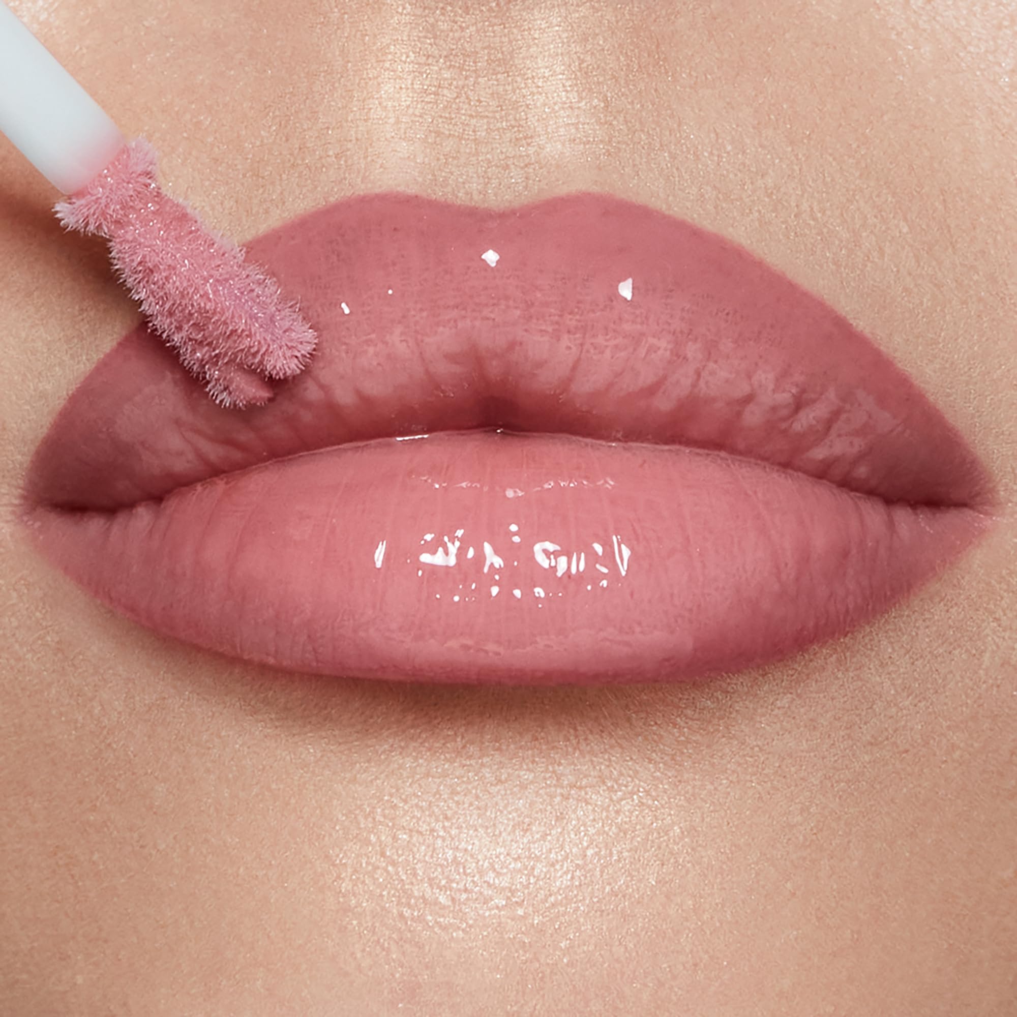 Charlotte Tilbury Collagen Lip Bath cap and label detail highlighting brand quality and gift-ready benefit