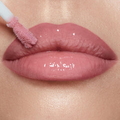 Charlotte Tilbury Collagen Lip Bath cap and label detail highlighting brand quality and gift-ready benefit