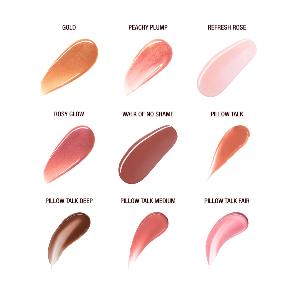 Charlotte Tilbury gloss applied on lips in a daytime look providing subtle plumping benefit