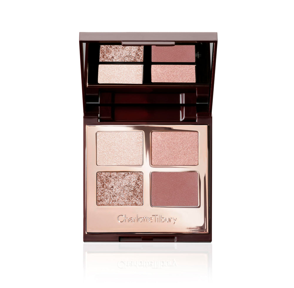 Charlotte Tilbury palette front view showing compact rose-gold packaging and logo benefit: travel-ready