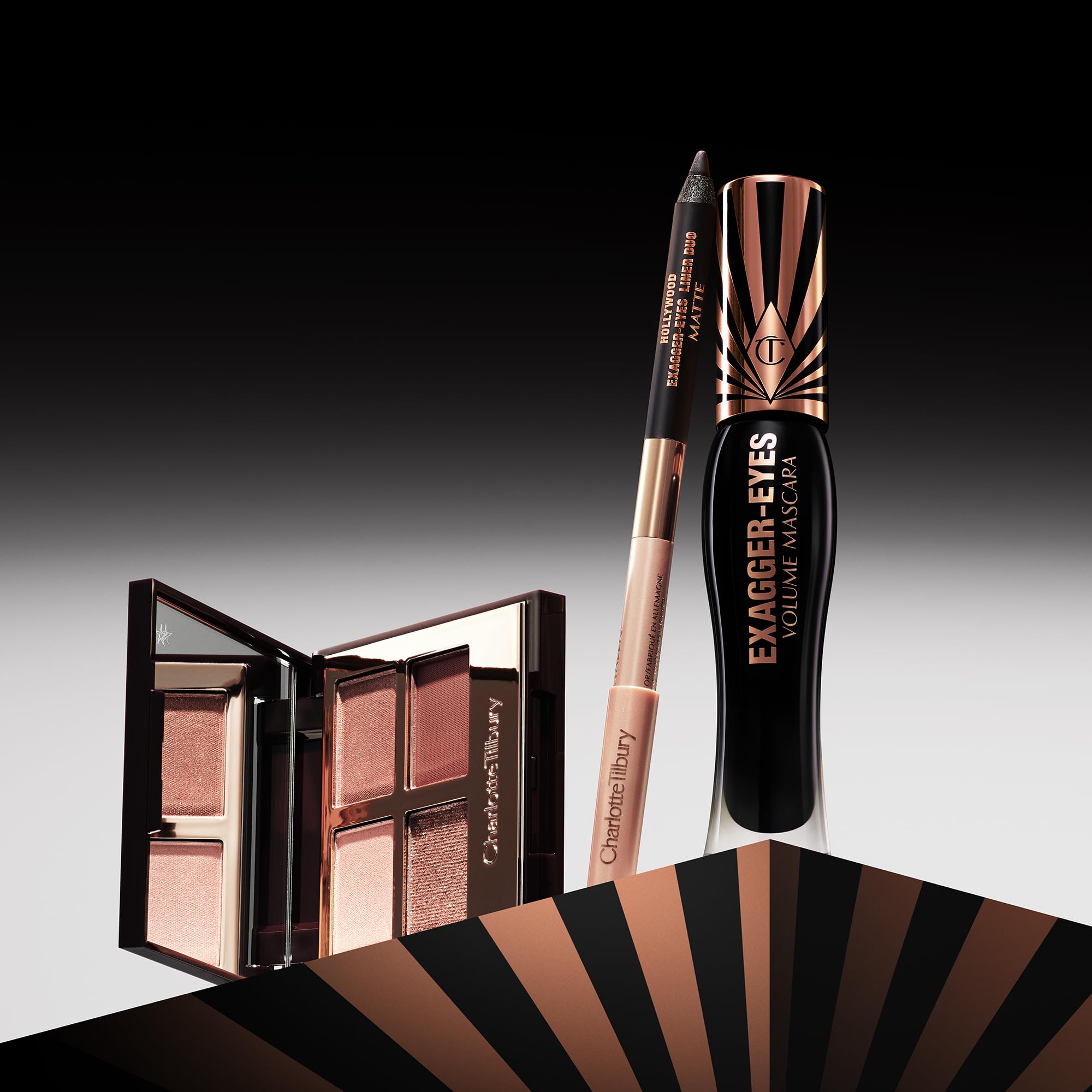 Charlotte Tilbury palette next to common items showing scale and packaging benefit: pocket-friendly size