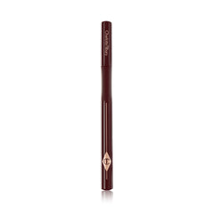 Charlotte Tilbury liner worn in lifestyle look showing durable, smudge-resistant flick for all-day wear
