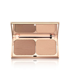 Charlotte Tilbury highlighter detail swatch delivering golden luminous glow