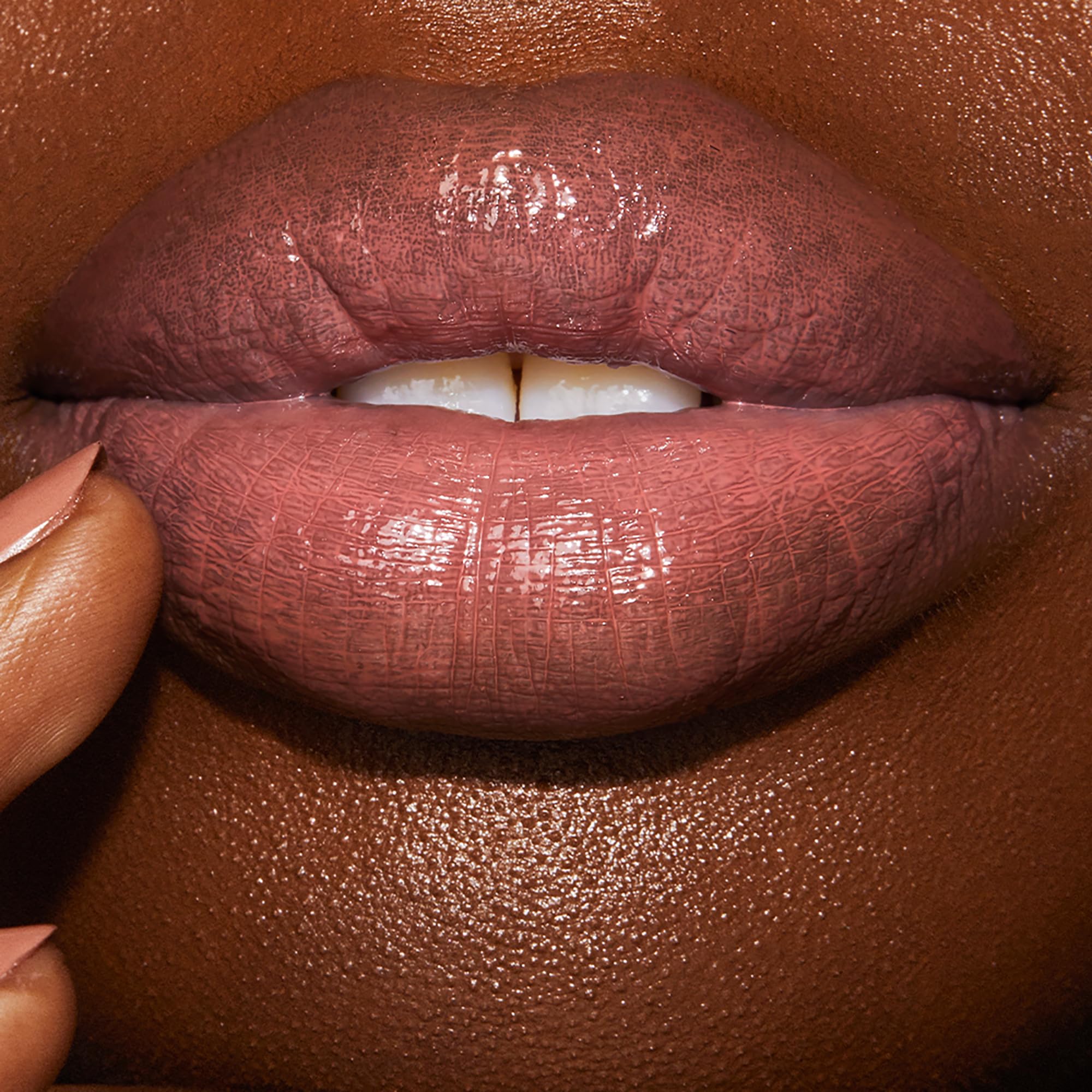 Charlotte Tilbury close-up of fondue-like texture showing hydrating gloss benefit