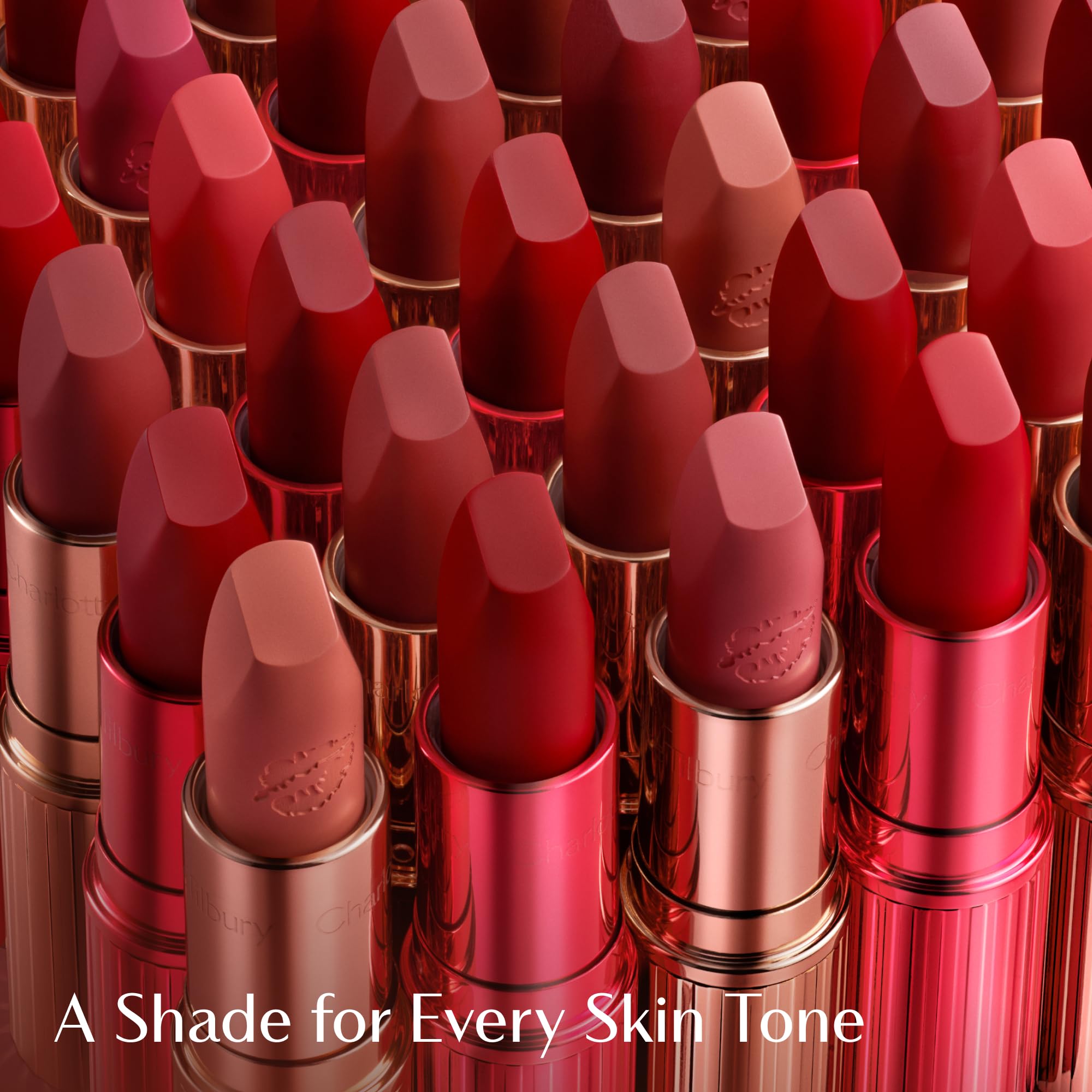 Charlotte Tilbury tube beside coin demonstrating compact travel-friendly size