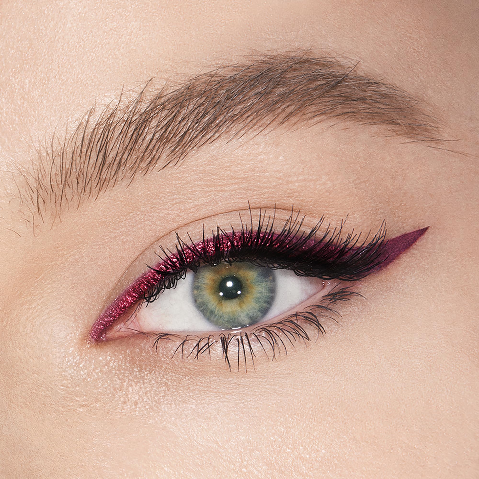 Charlotte Tilbury swatch of maroon matte and metallic shades showing pigmentation and blendability
