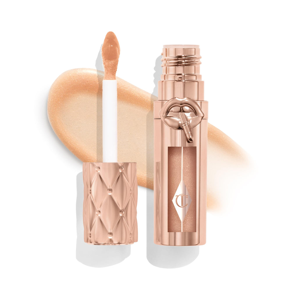 Charlotte Tilbury front packaging showing Nudegasm Diamonds gloss benefit high-shine