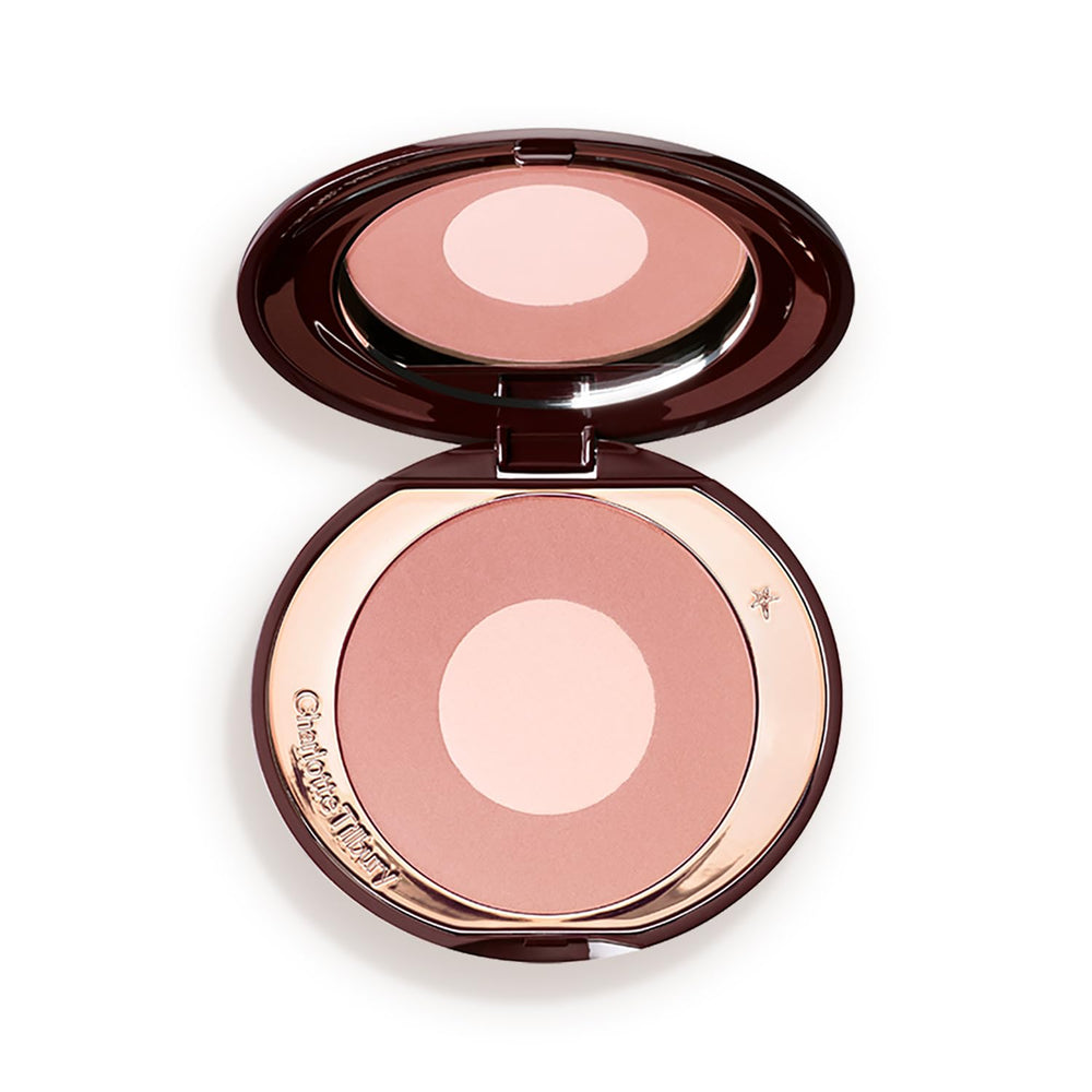 Charlotte Tilbury compact front view showing elegant packaging and immediate product appeal