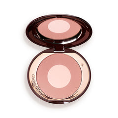 Charlotte Tilbury compact front view showing elegant packaging and immediate product appeal