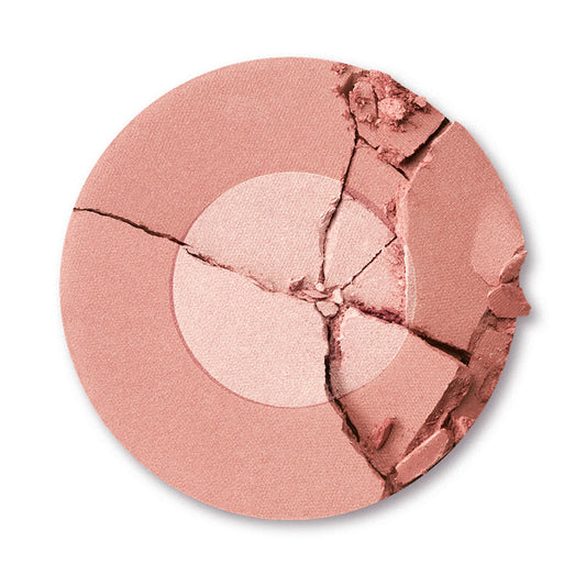 Charlotte Tilbury closeup of two‑tone powder texture highlighting shimmer and blendability