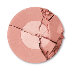 Charlotte Tilbury closeup of two‑tone powder texture highlighting shimmer and blendability