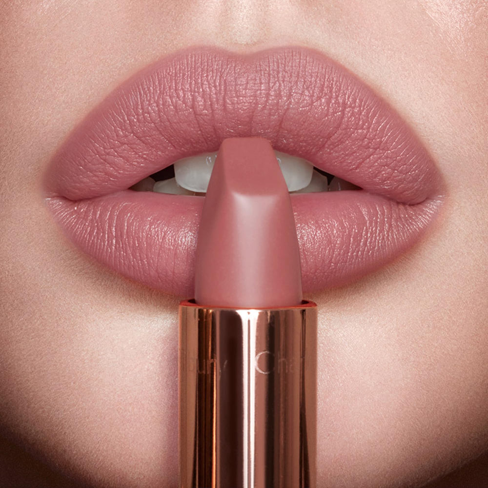 Charlotte Tilbury Pillow Talk on model smiling showing flattering everyday wear benefit