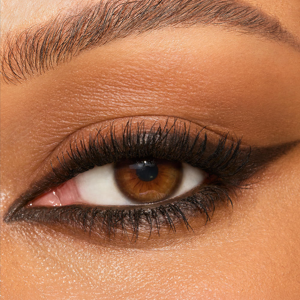 Charlotte Tilbury swatch on skin showing Barbarella Brown blendable texture