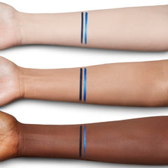 Charlotte Tilbury eyeliner in use closeup brightening eye and enhancing color contrast