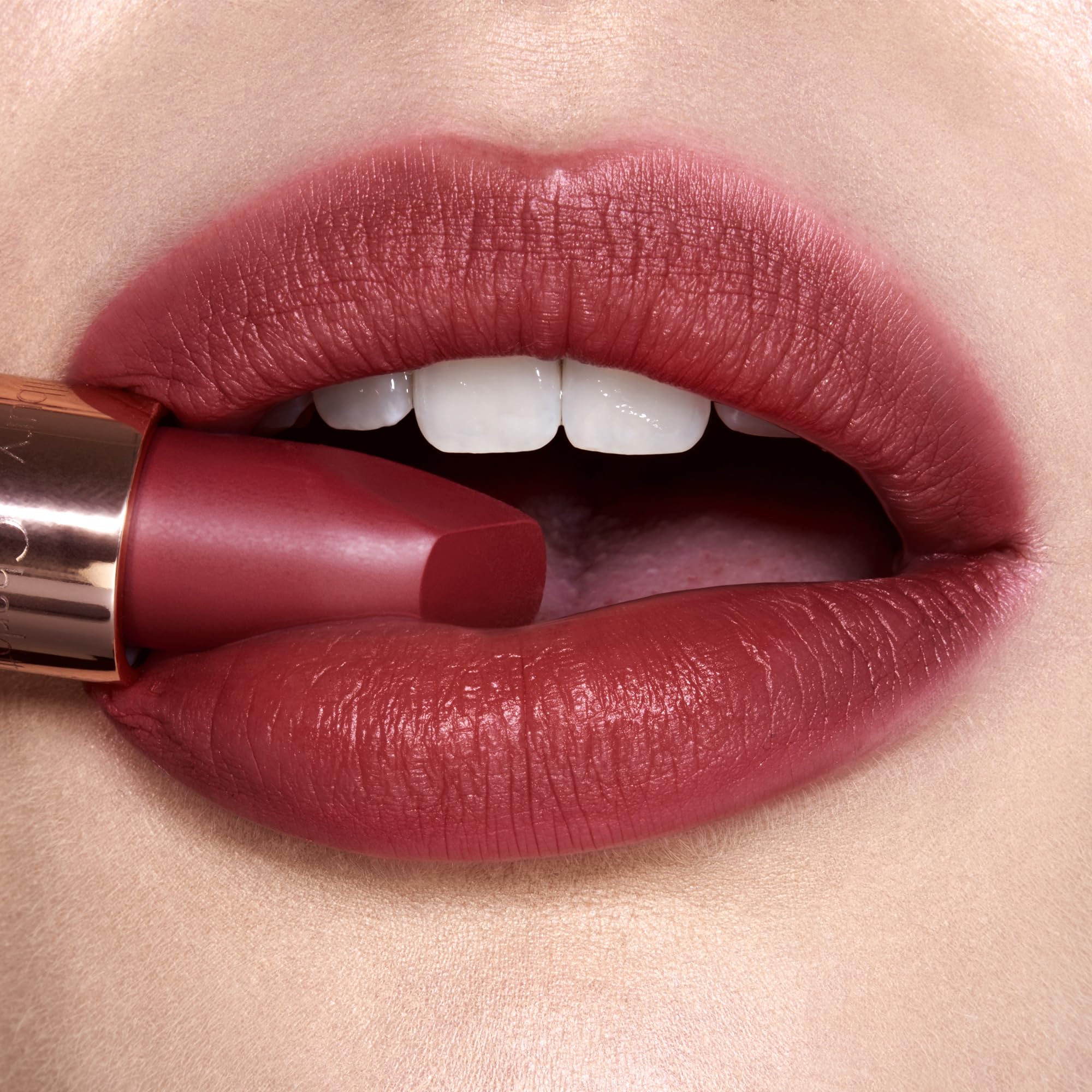 Charlotte Tilbury Walk Of No Shame applied on lips demonstrating flattering berry-rose finish
