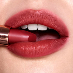Charlotte Tilbury Walk Of No Shame applied on lips demonstrating flattering berry-rose finish
