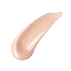 Charlotte Tilbury 40ml tube next to ruler showing actual size and travel-friendly convenience