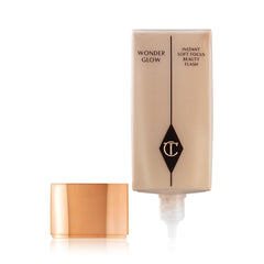Charlotte Tilbury primer applied under foundation illustrating improved base and longer wear benefit