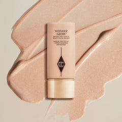 Charlotte Tilbury pump action releasing primer texture highlighting smooth application and hydration