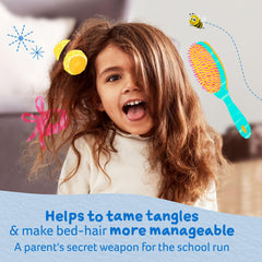 Childs Farm detangler spraying into hair to show application and quick knot release benefit