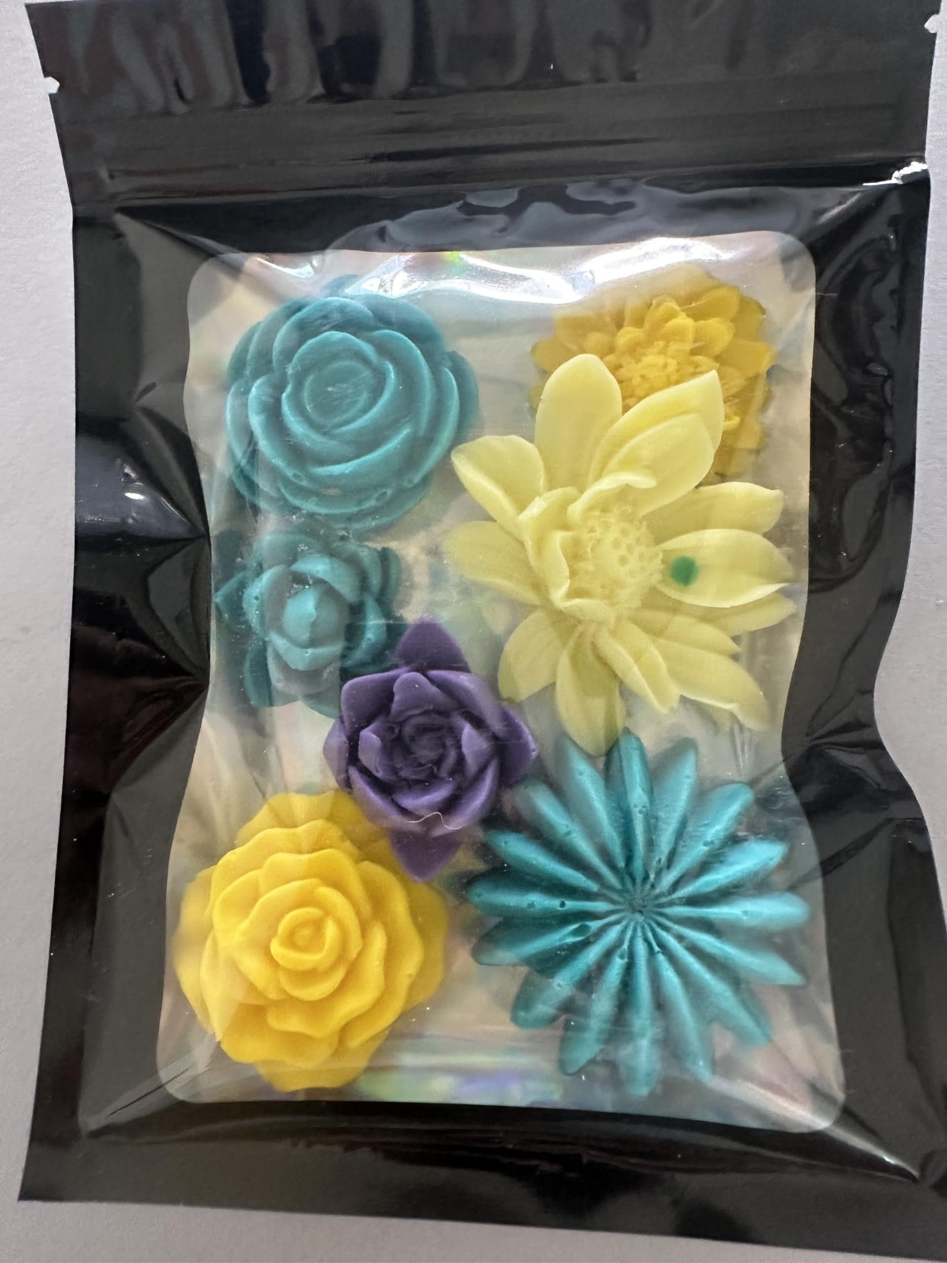 Chilvera soaps styled on a bathroom sink lending decorative charm and countertop appeal