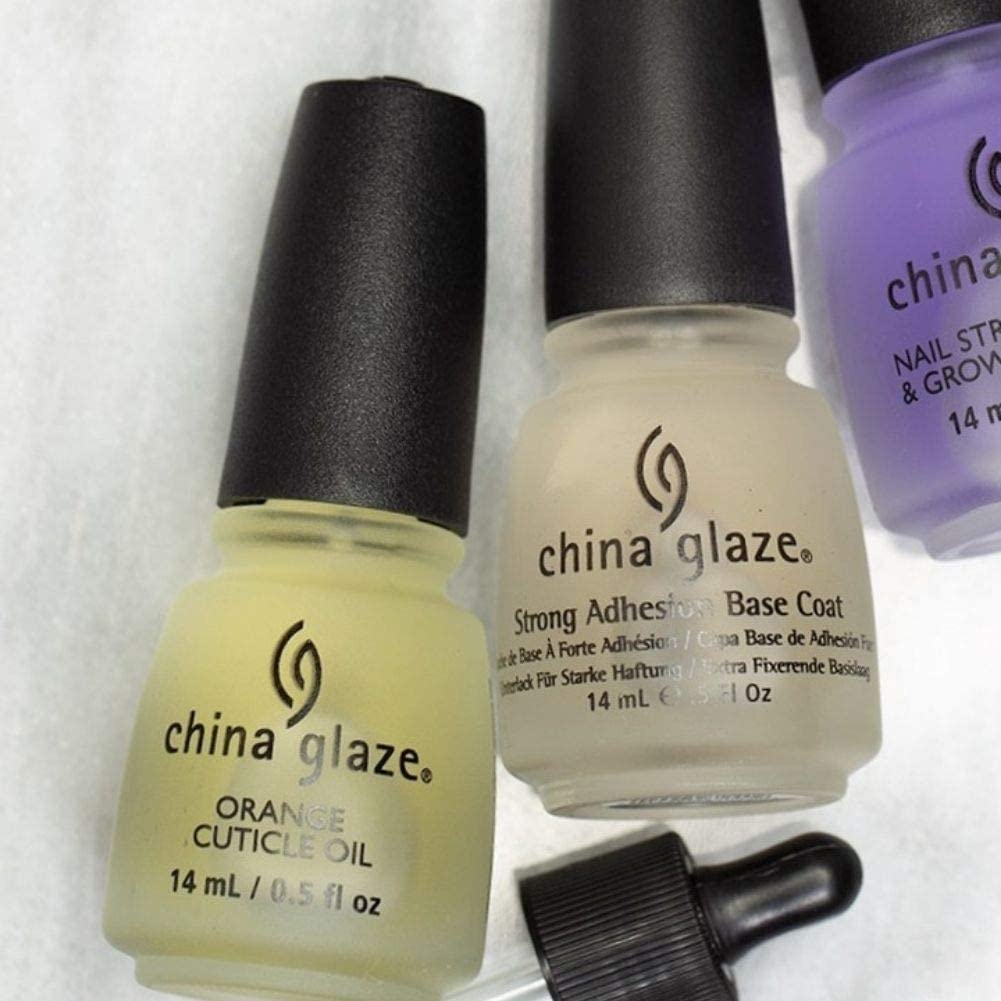 China Glaze .50 oz bottle next to a ruler to show compact travel-friendly size