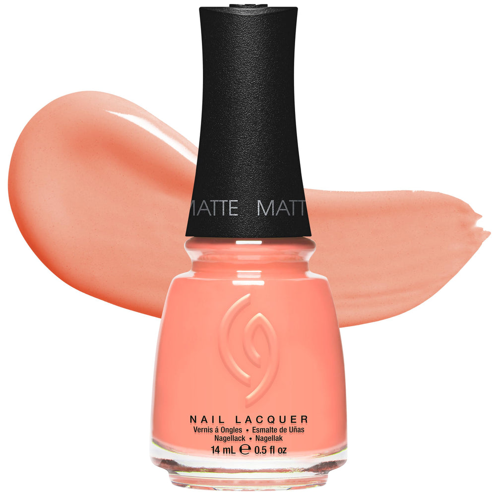 China Glaze bottle on beach towel lifestyle scene suggesting summer-ready color