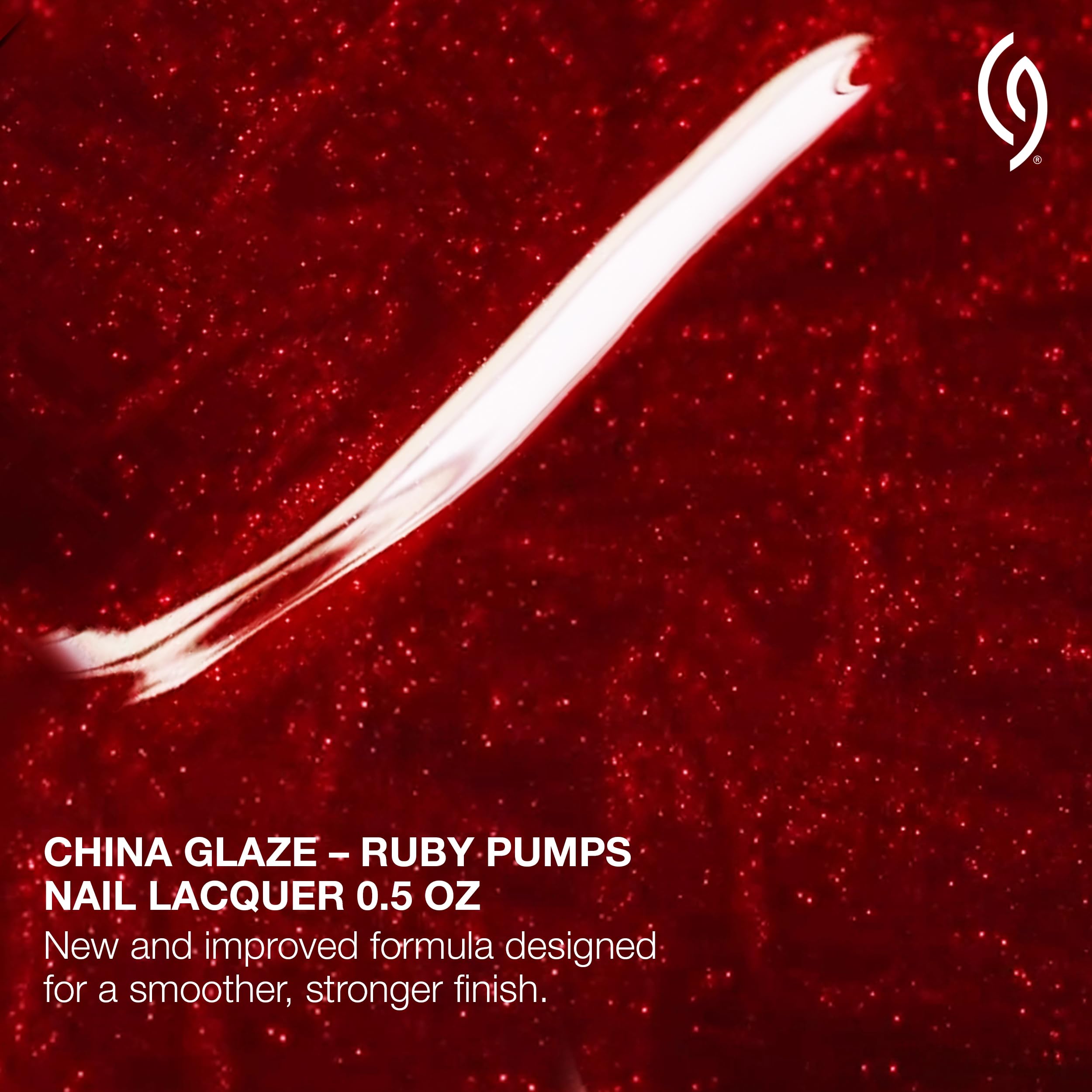China Glaze on fingernails showing full-coverage ruby shimmer and polished look
