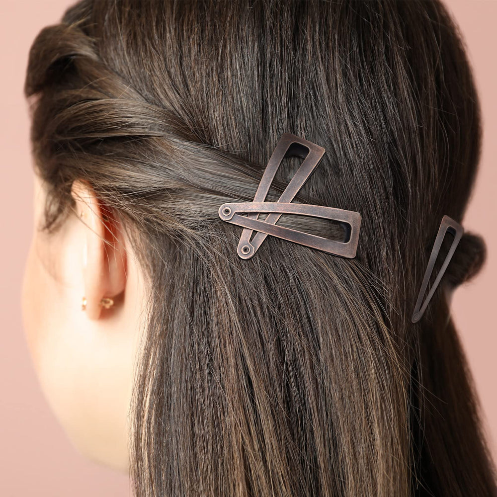 Chinco clip worn in beach-ready hair showing durable hold during activities