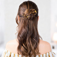 CHLINS hair fork securing a French twist for long-lasting style