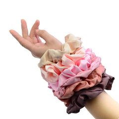 Chloven scrunchies on bedroom mirror showing quick-access styling convenience