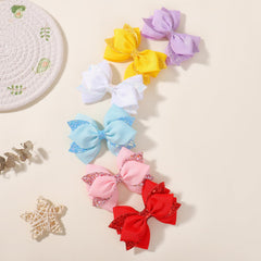 choicbaby bow worn with birthday outfit adding festive flair