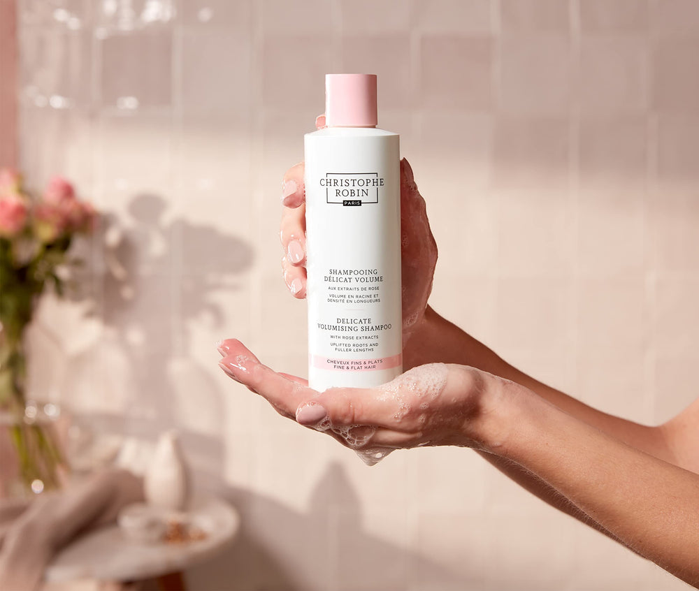 Christophe Robin shampoo on bathroom shelf in lifestyle setting promoting routine use