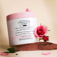 Christophe Robin product next to ruler showing 8.4 fl oz scale and value
